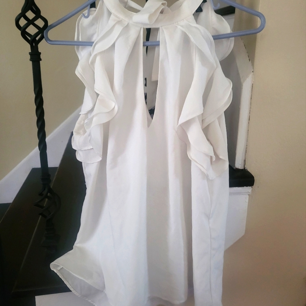 White/light ivory sleeveless beautiful ruffle top. Size small